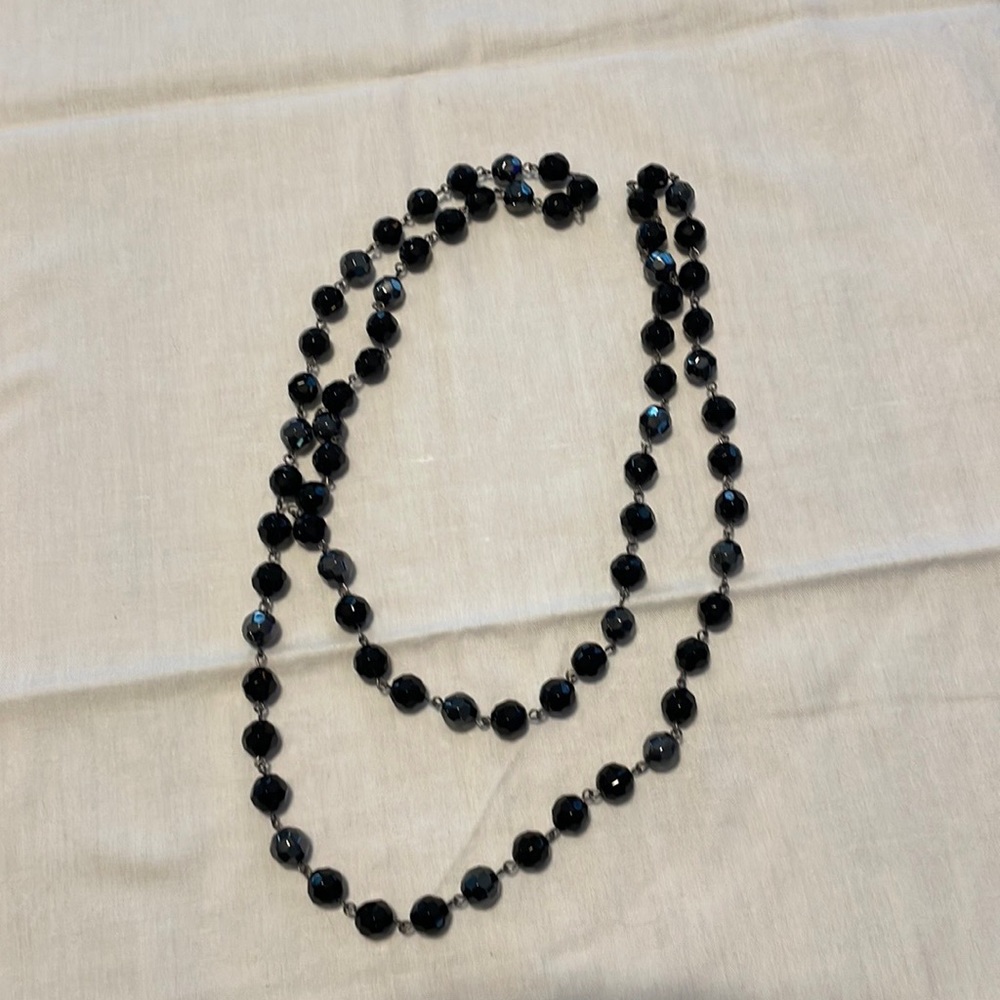 Long black beaded necklace